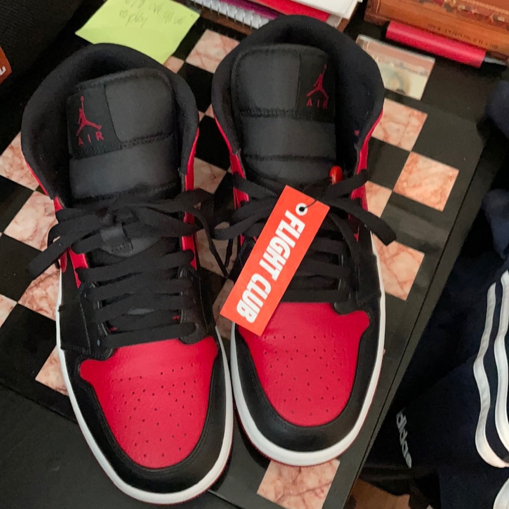 Black n red Jordan 1s retro throwbacks